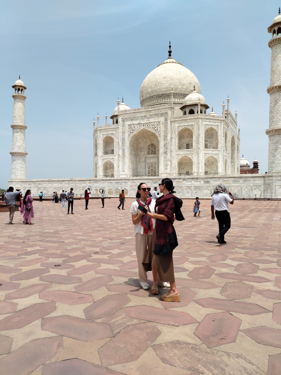 Mr. Verma with tourists smiling